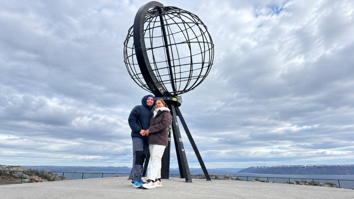 Couple Beneath the Arctic Globe Monument